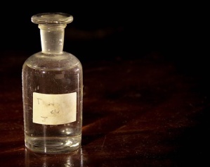 Old clear glass bottle on a table